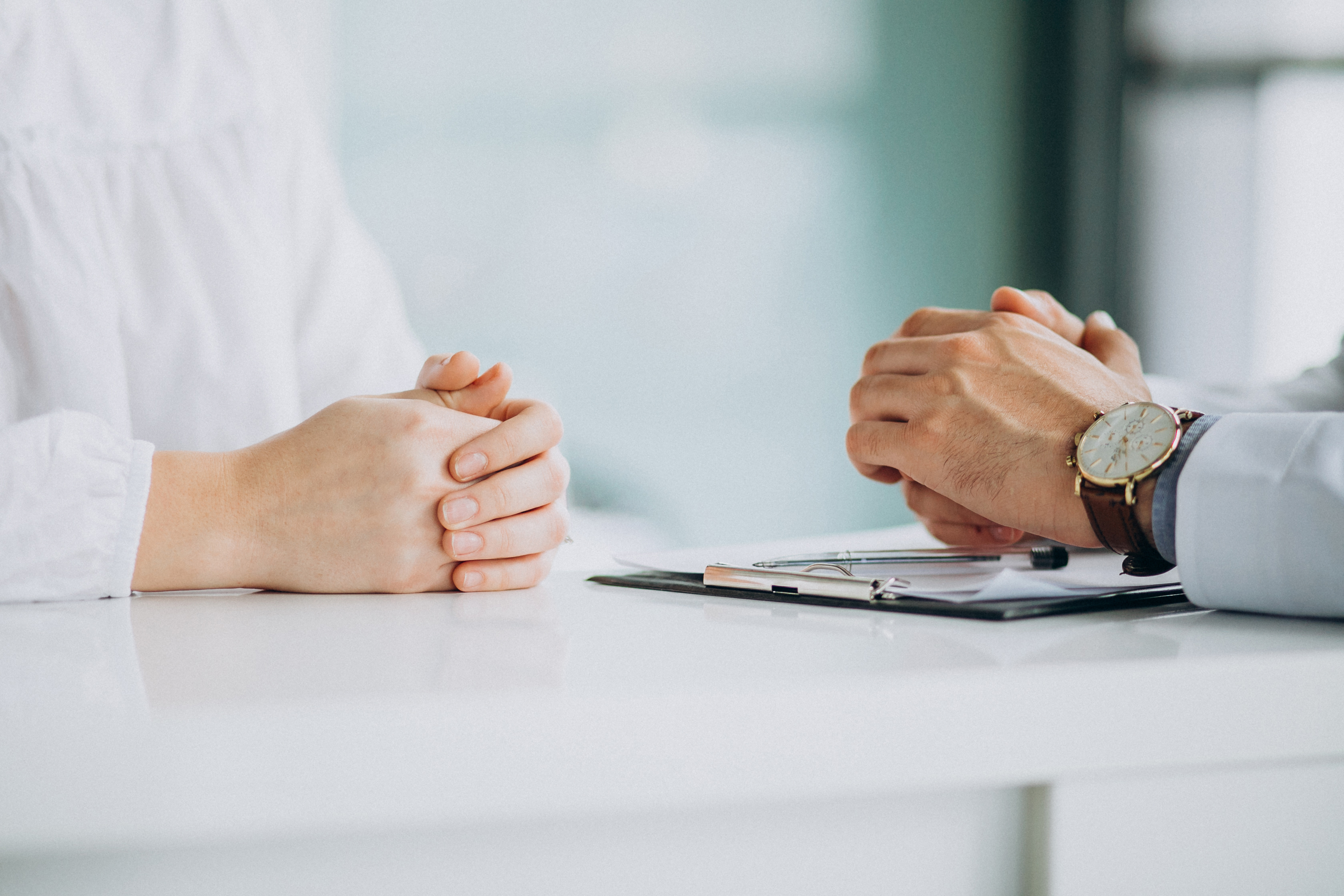 physician-consulting-his-patient-clinic.jpg