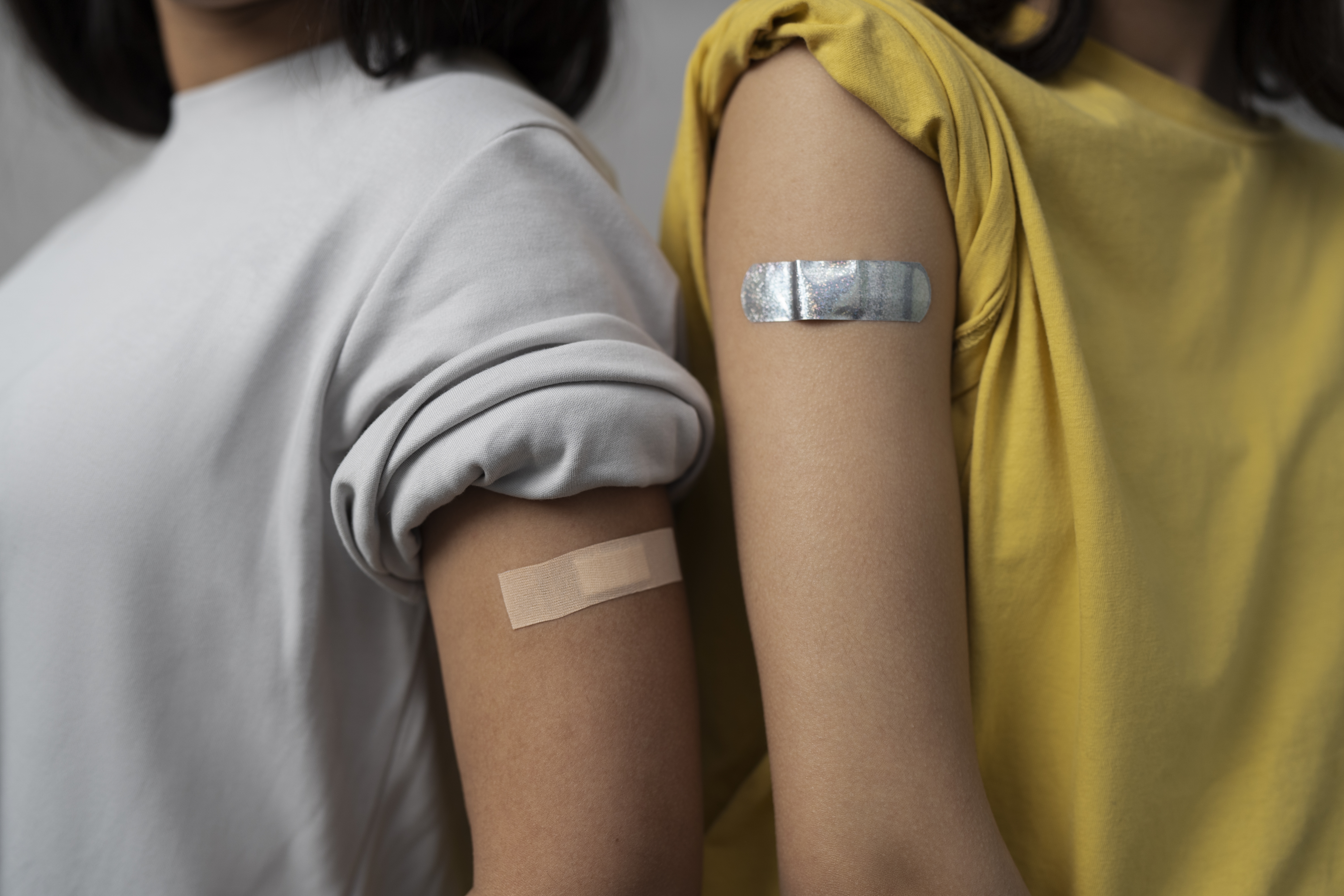 side-view-women-wearing-band-aids.jpg