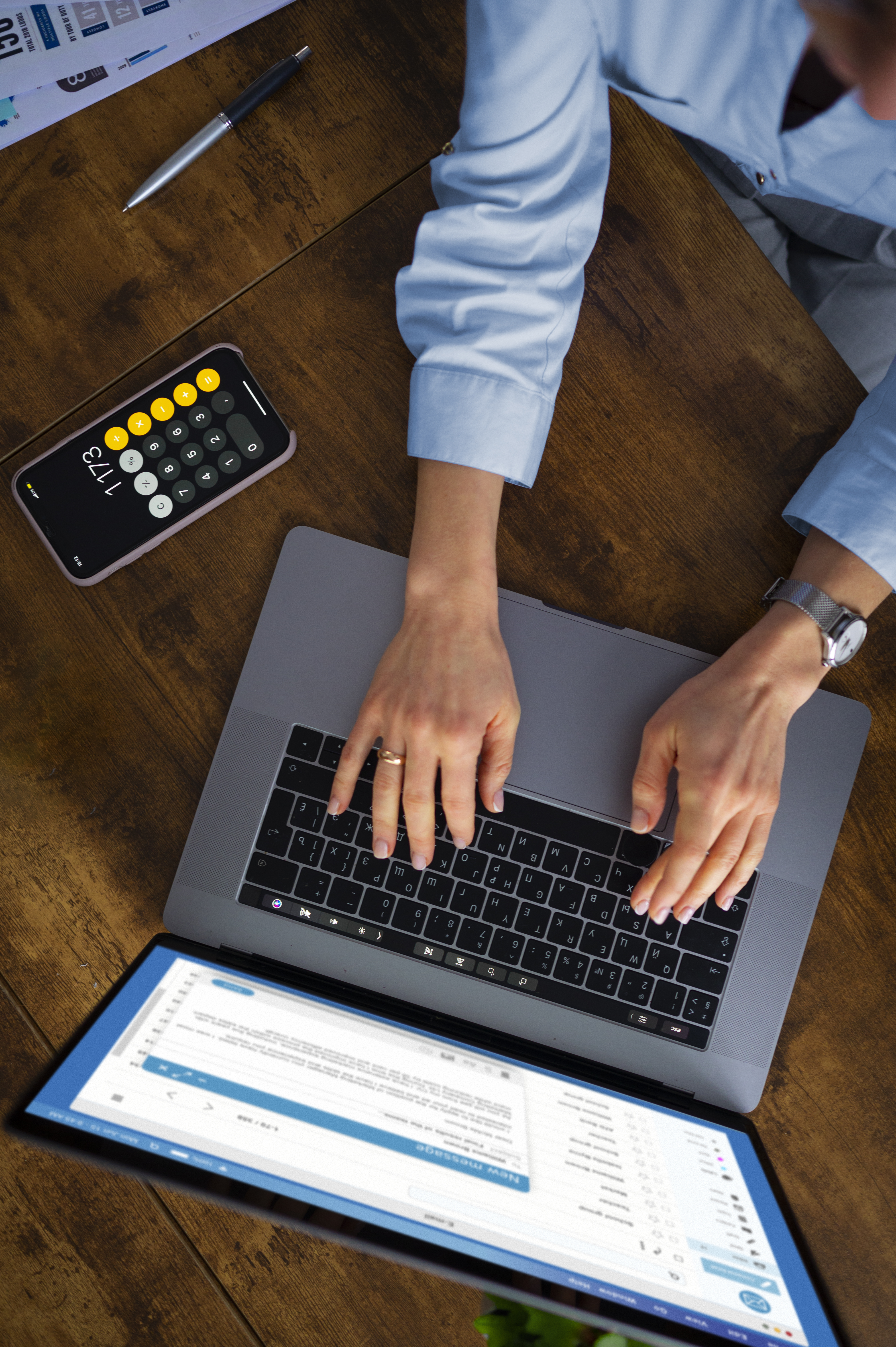 view-woman-typing-laptop.jpg